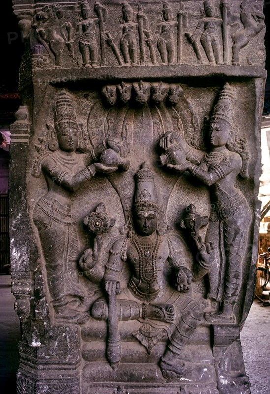 Vishnu with hi consorts Sridevi and Bhudevi sculpture in Ramaswamy temple pillared Mahamandapatam in Kumbakonam, Tamil Nadu, India, Asia