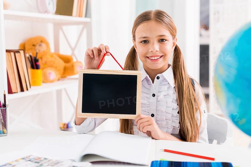 Cheerful schoolgirl uniform studying class