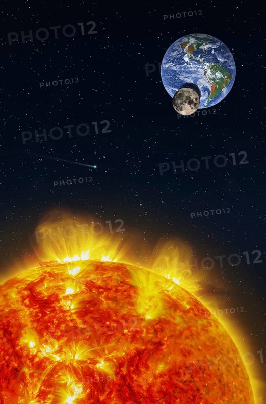 Fantasy composition of a solar eclipse seen from the Sun with the Moon projecting its shadow on the planet Earth. A comet runs in a stars field. Elements of this image furnished by NASA