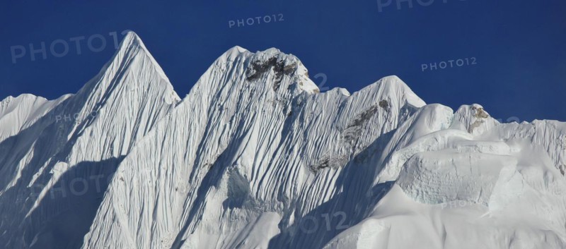 Mountain covered by glacier. Sharpe ridge. Scene in the Everest National Park Nepal