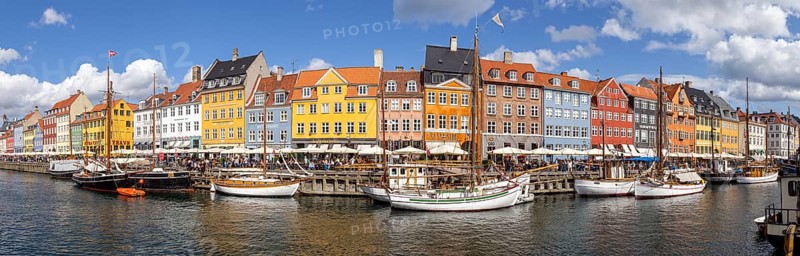 Copenhagen, Denmark, August 21, 2019: Panoramic view of the famous Nyhavn district in the city centre, Europe