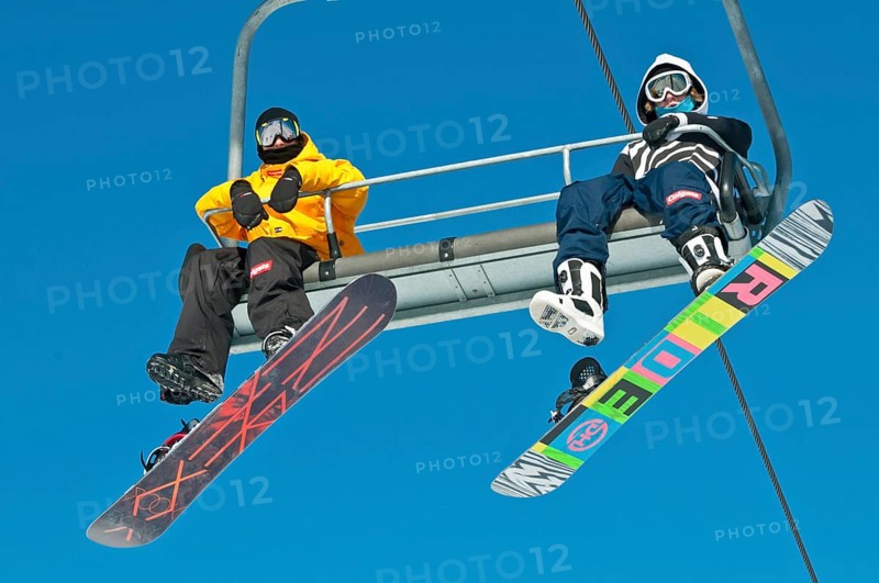 Snowboarders on a ski lift, Canada Olympic Park, COP, Calgary, Alberta, Canada, North America
