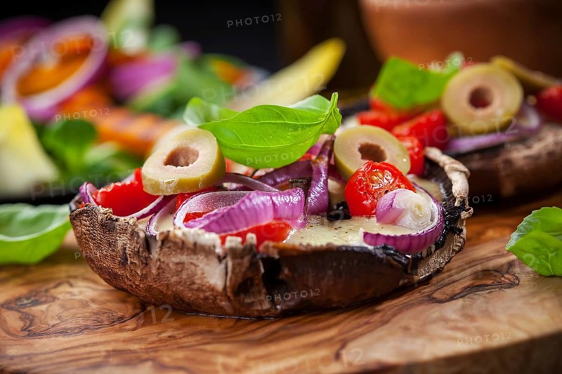 Giant Portobello mushrooms stuffed with mozzarella and tomatoes