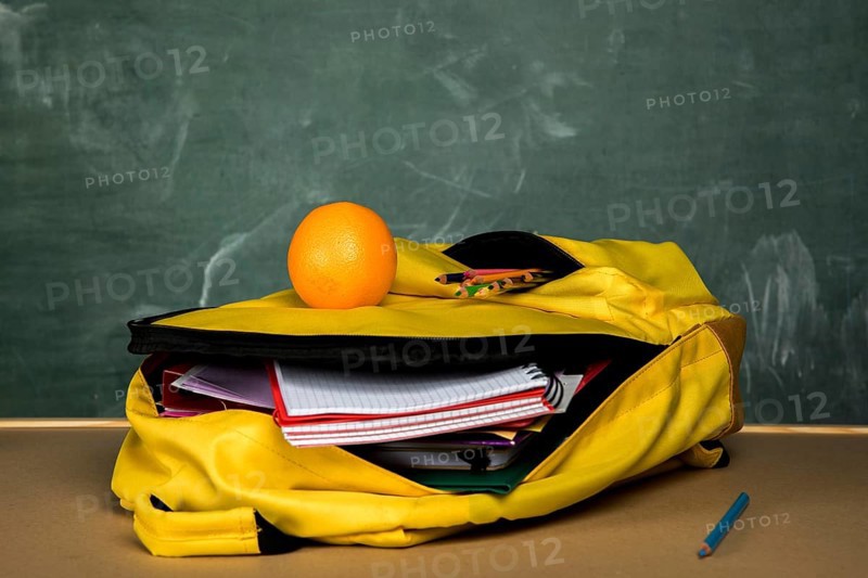 Yellow knapsack with copybooks orange