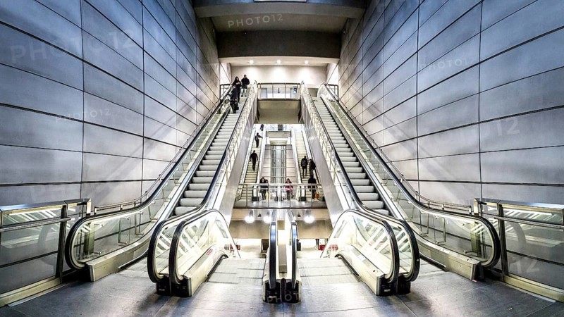 Copenhagen, Denmark, January 20, 2017: People on escalators at Forum metro station, Europe