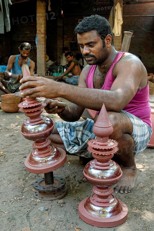 Engraver making copper gopura kalasam in Kumbakonam, Tamil Nadu, India, Asia