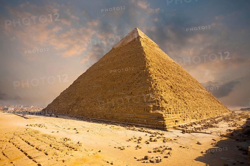 A beautiful fiery sky behind the Giza pyramid of Khafre in Cairo, Egypt, Africa