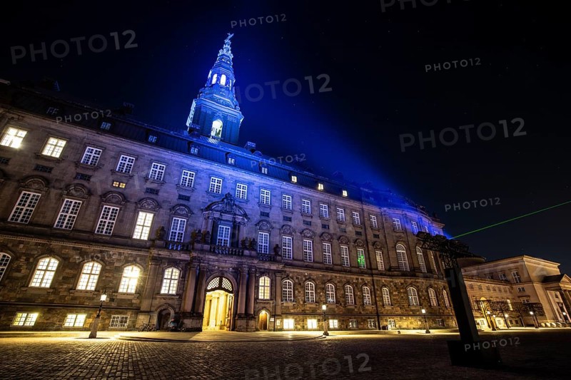 Copenhagen, Denmark, February 15, 2019: The seat of the Danish parliament Christiansborg Palace illuminated for the Light Festival 2019, Europe