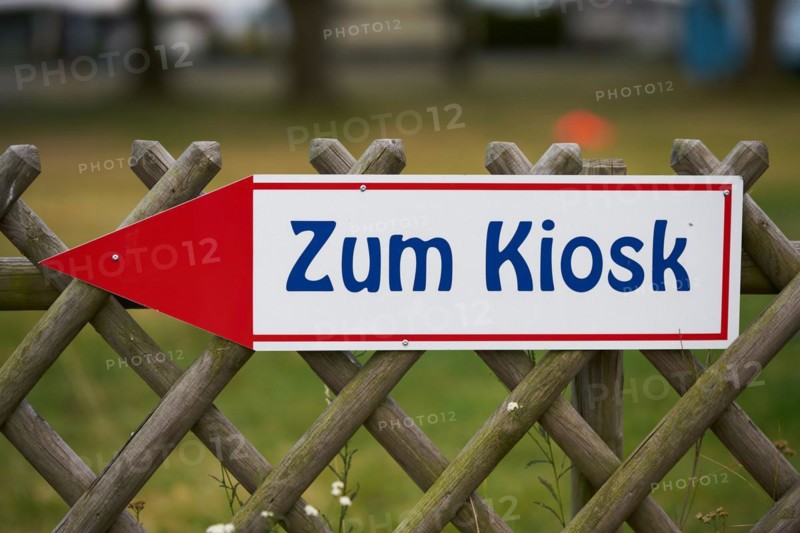 Signpost to a kiosk on a campsite near Magdeburg