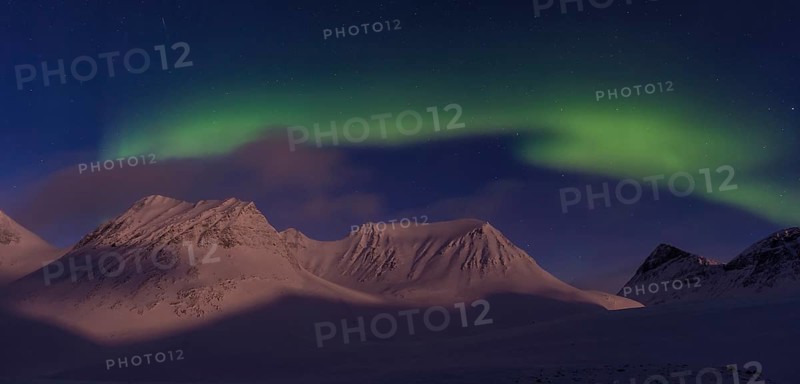 Northern Lights (Aurora borealis) over moonlit mountains in the valley Stuor Reaiddavaggi, Kebnekaisefjaell, Norrbotten, Lapland, Sweden, March 2013, Europe