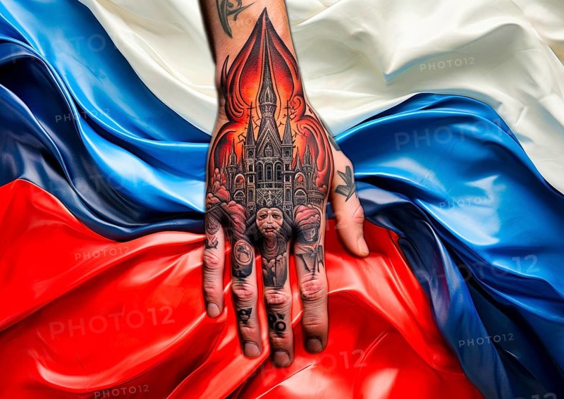 A hand tattooed with Russian motifs lies on a national flag with the colours white, blue and red, illustration with KI generated, AI generated