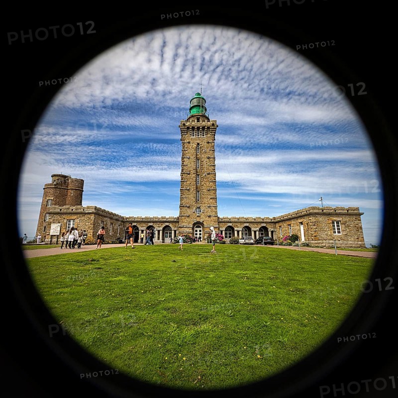 Cap Fréhel lighthouse with tourists, Emerald Coast, Brittany, France, Europe