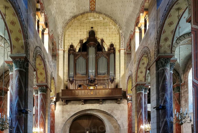 Organ loft of Saint Austremoine church, Issoire. Puy de Dome department. Auvergne-Rhone-Alpes, France, Europe