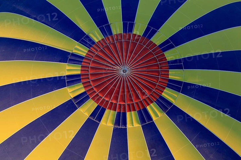 Interior view of a hot air balloon with yellow-blue stripes and red centre, Turkey, Asia