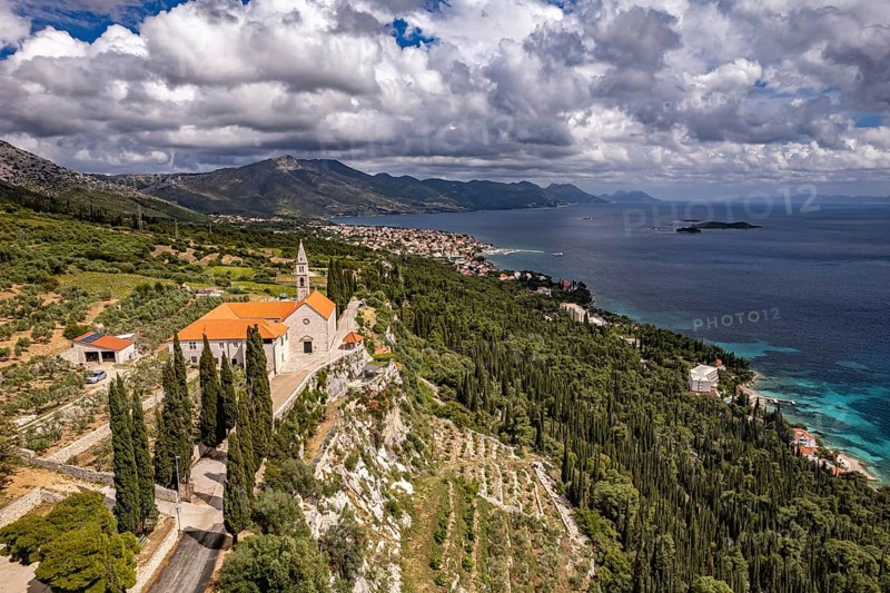 Franciscan monastery and church Madonna of the Angels and the coast seen from above, Orebic, Peljesac peninsula, Croatia, Europe