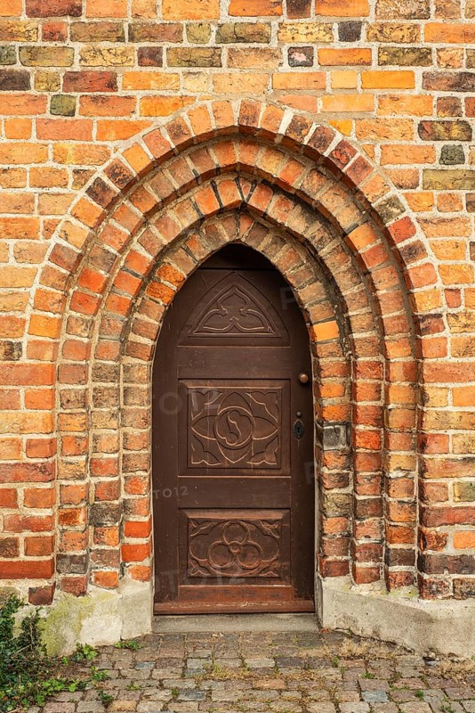 Old door in a brick wall in the monastery church in Ystad, Skåne Country, Sweden, Scandinavia, Europe