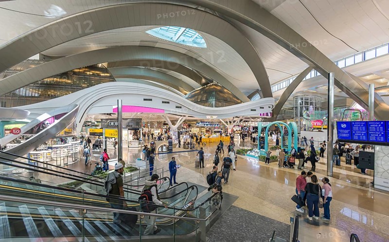 Abu Dhabi Airport, Zayed International Airport with passengers. Duty free shop. The new Terminal A has a capacity of 45 million passengers per year. Modern architecture. Abu Dhabi, United Arab Emirates, UAE, Asia