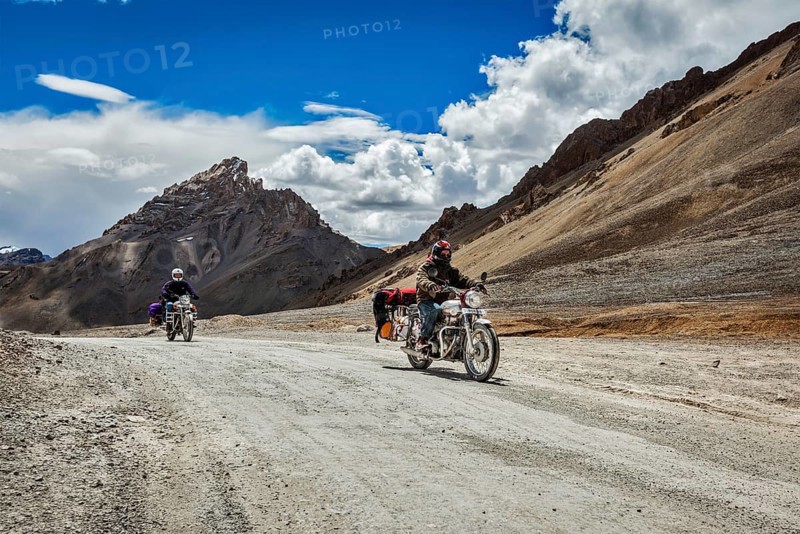 LADAKH, INDIA, SEPTEMBER 2, 2011: Bike tourists in Himalayas on famous high altitude Leh–Manali Highway. Himalayan bike tourism is gaining popularity for tourists and bikers from all over the world