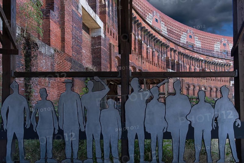 Figures as visitors in the inner courtyard of the Congress Hall, unfinished National Socialist monumental building on the Nazi Party Rally Grounds, Nuremberg, Middle Franconia, Bavaria, Germany, Europe