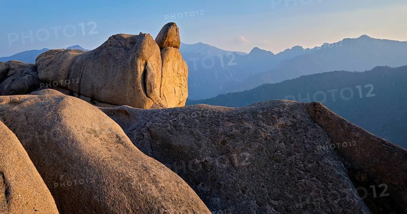 View of stones and rock formations from Ulsanbawi rock peak on sunset. Seoraksan National Park, South Corea