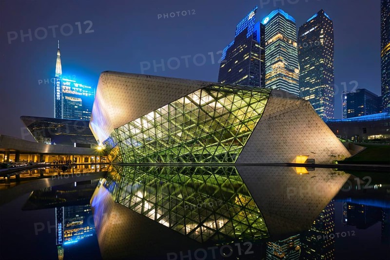 GUANGZHOU, CHINA, APRIL 27, 2018: Guangzhou Opera House designed by famous Iraqi architect architect Zaha Hadid illluminated at night