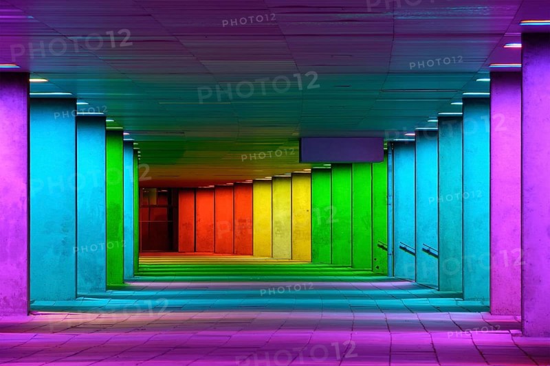 Colorful mulitcolord illuminated gallery tunnel rainbow passage under NAI building, Nederlands Architecture Institute near Museum Park, Rotterdam, The Netherlands, Europe