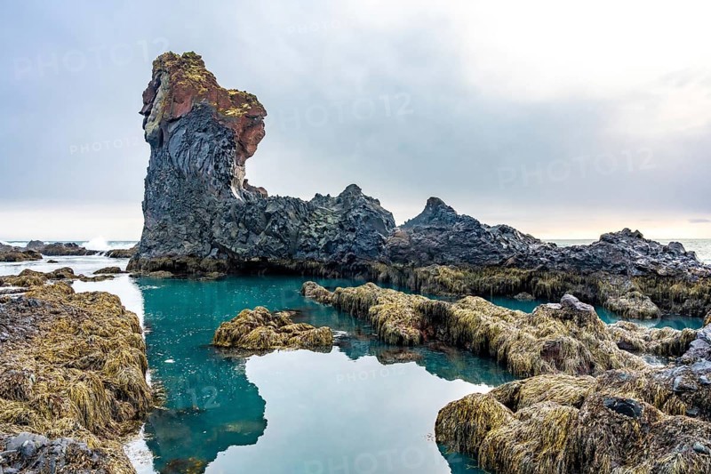 Beautiful rock formations by the sea at Djupalonssandur beach on the Snaefellsnes peninsula in winter in Iceland