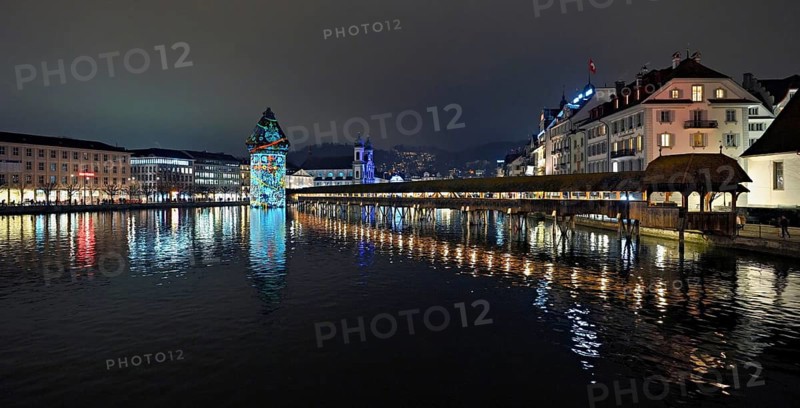 Wassertum with light installation, Chapel Bridge on the right, Jesuit Church on the Reuss at dusk behind, Old Town, Lilu, Light Festival 2025, Lucerne, Canton of Lucerne, Switzerland, Europe