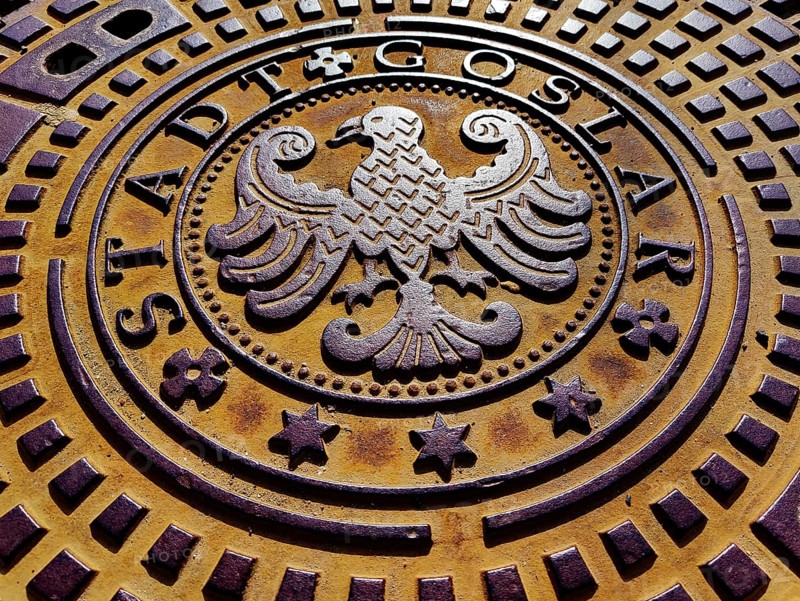 Manhole cover with town coat of arms, Goslar, Harz, Lower Saxony, Germany, Europe