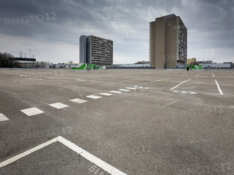 Symbolic image economic crisis, dark clouds in the sky, empty parking deck at Olympia-Einkaufszentrum OEZ, Pelkovenstraße, Munich, Bavaria, Germany, Europe