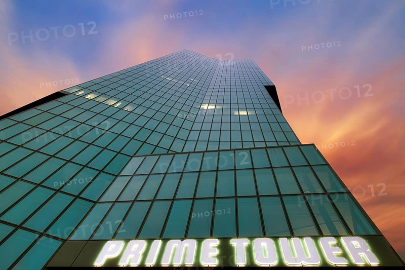 Modern high-rise building Prime Tower with glass facade, coloured clouds in the evening sky after sunset, Zurich West, Canton of Zurich, Switzerland, Europe