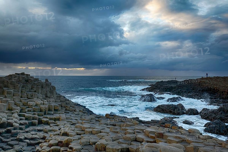 Rocky coast with basalt columns, coastline, dusk, rain clouds, Giant's Causeway, Giants Causeway, Causeway Coastal Route, Antrim, Northern Ireland, Great Britain