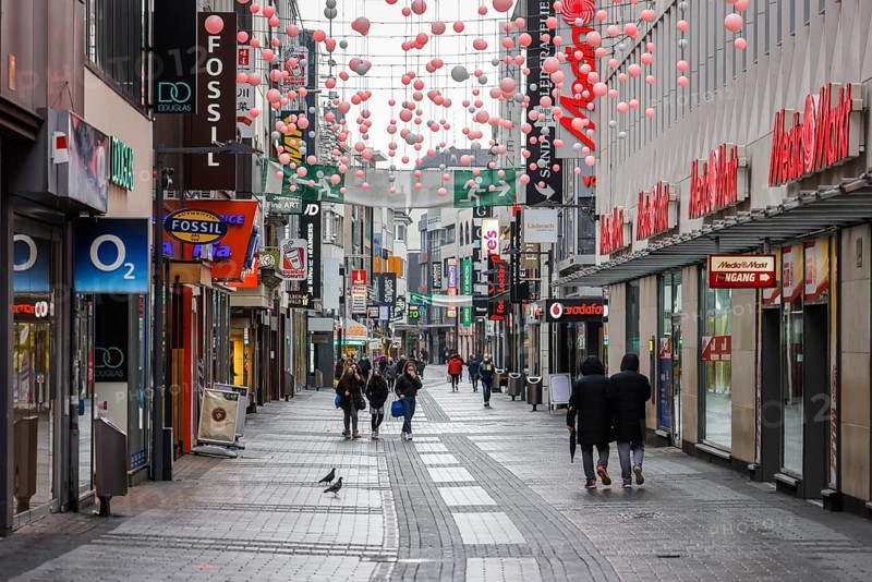 Cologne, North Rhine-Westphalia, Germany - Cologne city centre in times of the corona crisis during the second lockdown, the shops are closed, only a few passers-by stroll along Hohe Straße on Friday afternoon