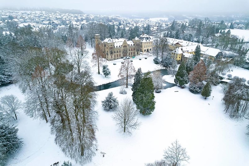 Herdringen Castle seen from above in the snow, Herdringen, Arnsberg, Hochsauerlandkreis, North Rhine-Westphalia