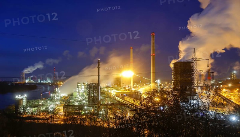 Duisburg, Ruhr area, North Rhine-Westphalia, Germany - ThyssenKrupp Steel, Schwelgern coking plant on the Rhine in Duisburg Marxloh, behind Walsum coal-fired power station