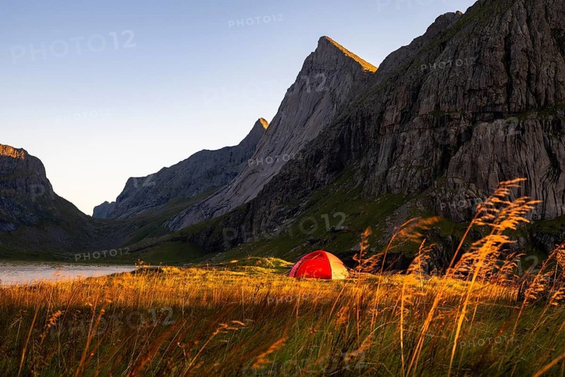 Red tent on the beach at Horseid, Lofoten, Norway, Europe