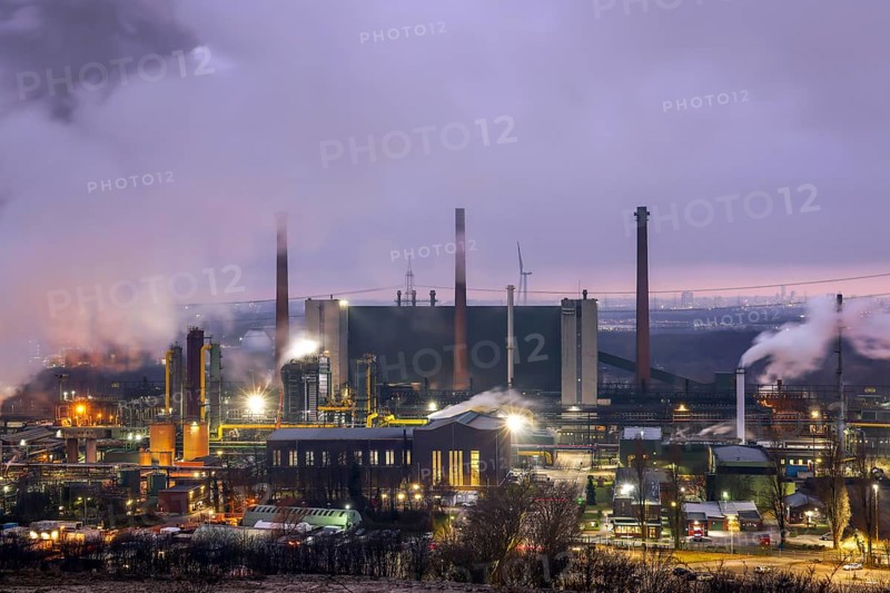 Bottrop, North Rhine-Westphalia, Germany, The Prosper coking plant is one of three operating coking plants in the Ruhr area. The Prosper coking plant is the last coking plant to be operated by the successor company to Ruhrkohle AG, RAG Deutsche Steinkohle AG. It was taken over by the steel group ArcelorMittal in 2011. The coking plant is designed for an annual production of almost two million tonnes of coke. At the back right, the skyline of Essen city centre, Europe