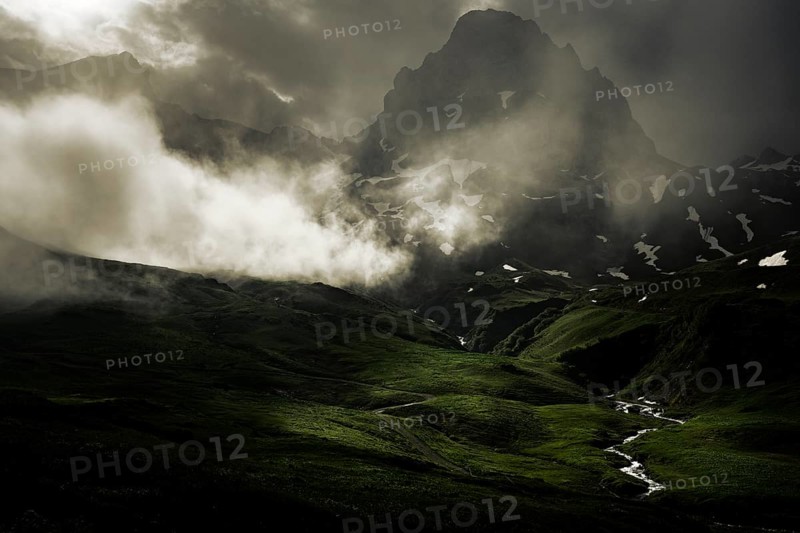 Peaks in the morning light and alpine landscape with dramatic clouds, Lech, Lechquellengebirge, Vorarlberg, Austria, Europe