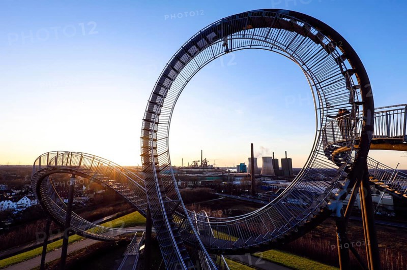 Tiger and Turtle, Magic Mountain is a landmark modelled on a roller coaster, the large sculpture is a walk-in work of art by Heike Mutter and Ulrich Genth, which was developed as part of the Ruhr.2010 Capital of Culture, behind HKM Hüttenwerke Krupp Mannesmann and RWE Power AG, Duisburg, Ruhr area, North Rhine-Westphalia, Germany, Europe