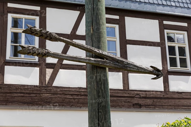 Large wooden arrow as a signpost in Mülsen, Zwickau district, Saxony, Germany, Europe