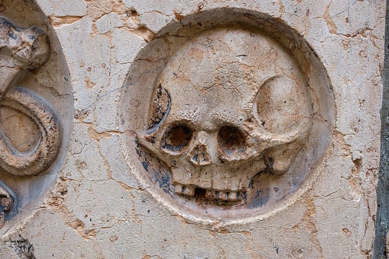 Relief of a skull on an epitaph, Church of Our Lady, or Cathedral of Our Lady, in Munich, Bavaria, Germany, Europe