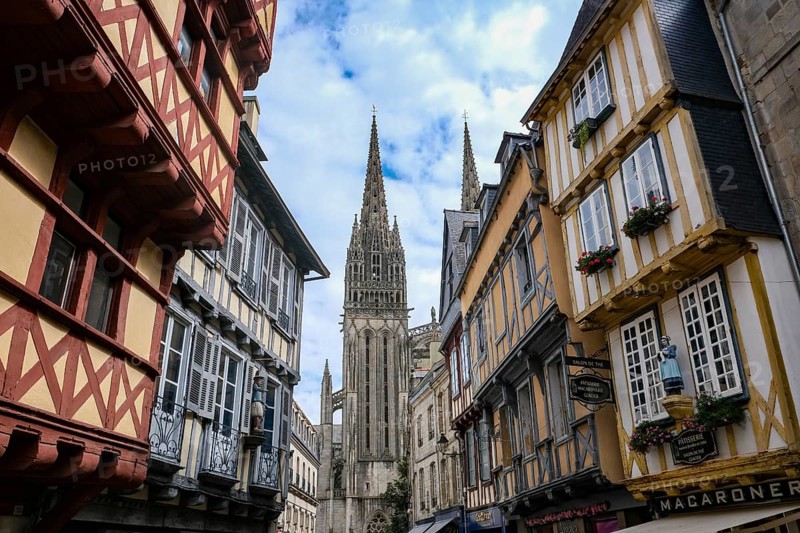 Quimper, Brittany, France - Quimper, Kemper in Breton, is the capital of the historic Cornouaille region in Brittany and the seat of the prefecture of the Département Finistère. Old town with half-timbered houses and the Saint-Corentin cathedral at the back