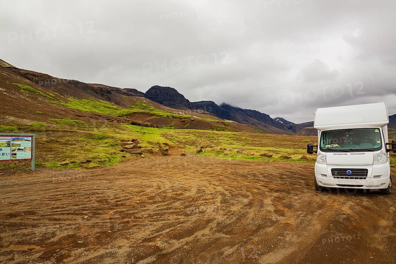 Camping car parking at Laugarvatnsvellir. Laugarvatnsvellir are dry flatlands to the east of Reyðarbarmur. Two caves on the west side of the flats were often used to house sheep but were the home of people during the first decades of the last century