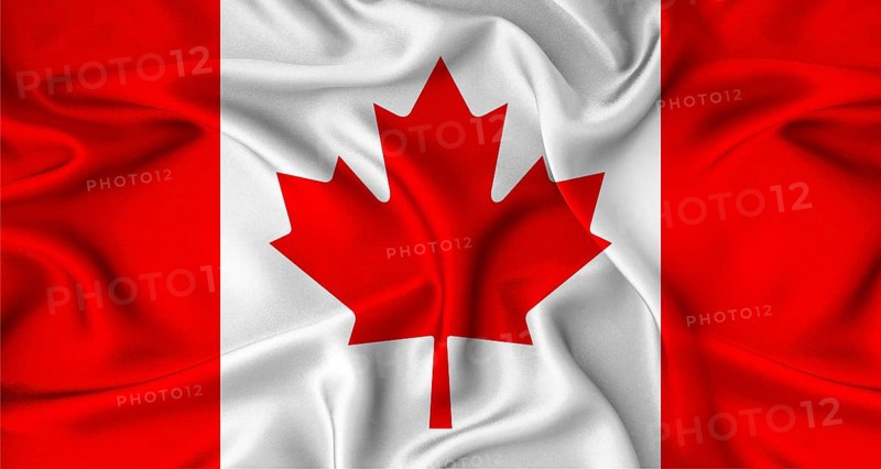 Close up of flag of Canada with cloth texture. Realistic Canada flag waving.