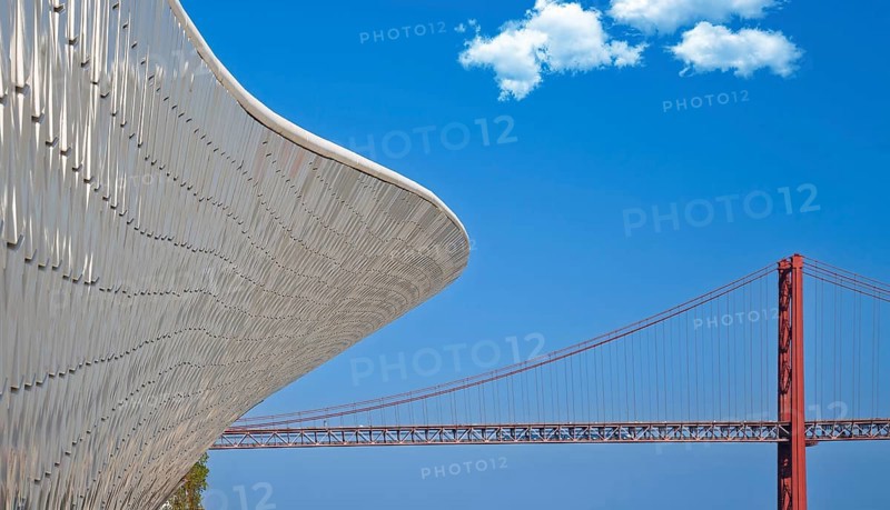 Lisbon, Landmark suspension 25 of April bridge over Tagus reiver near Belem tower