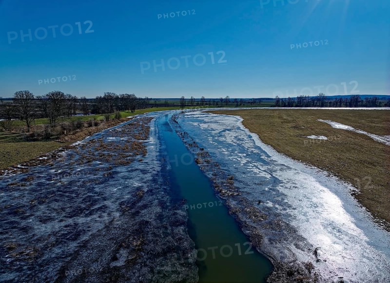 Icy drainage ditch in the landscape of the Havel floodplain in the Altmark. Aerial view. Havelberg, Saxony-Anhalt, Germany, Europe
