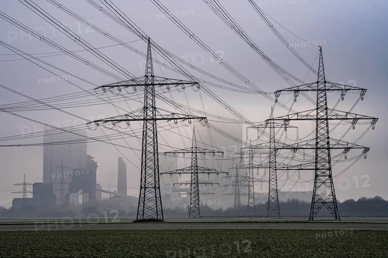 Large power line, 380 KV extra-high voltage lines, near Rommerskirchen, RWE lignite-fired power station Niederaußem in the fog, North Rhine-Westphalia, Germany, Europe