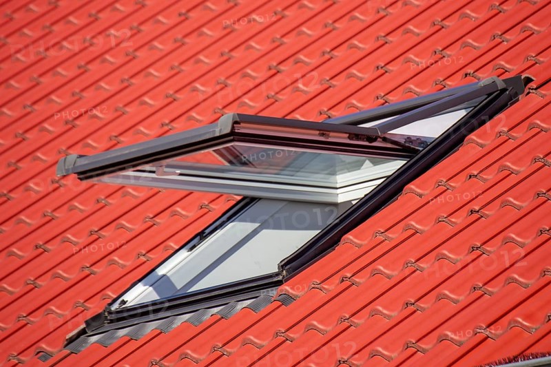 Close-up of a half-open skylight on a new building
