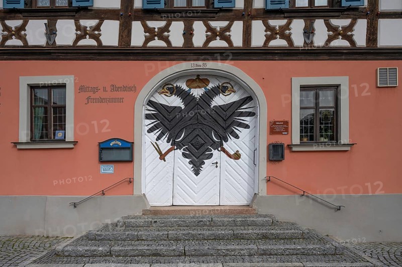 Double eagle on the entrance gate of today's Gasthof Obleyhof, 1385 to 1803 Spitalhof and then brewery until 1948, Baunach, Upper Franconia, Bavaria, Germany, Europe