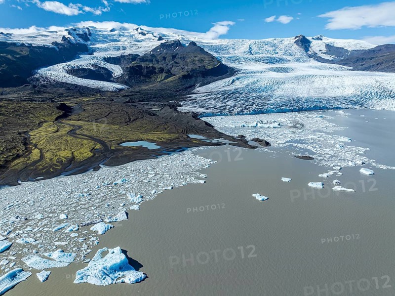 Aerial view over the glacial lake Fjallsárlón, glacier Fjallsjökull, part of Vatnajökull glacier, Iceland, Europe
